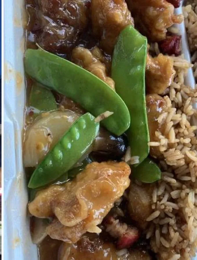 Wok-fresh chicken with snow peas and fried rice from Tsang's Cafe